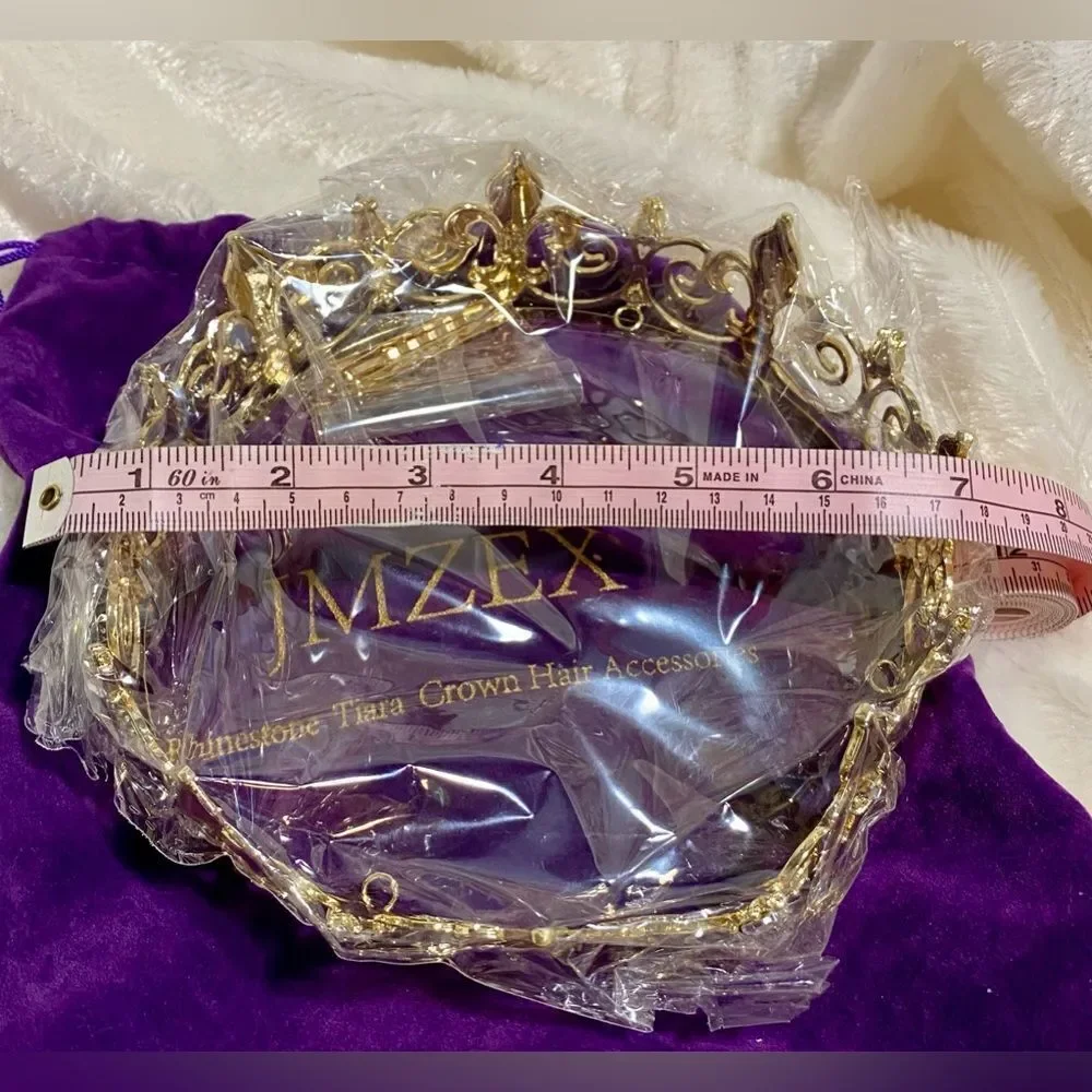 Gold tone crown with rhinestones, matching hair clips, and storage bag NWT